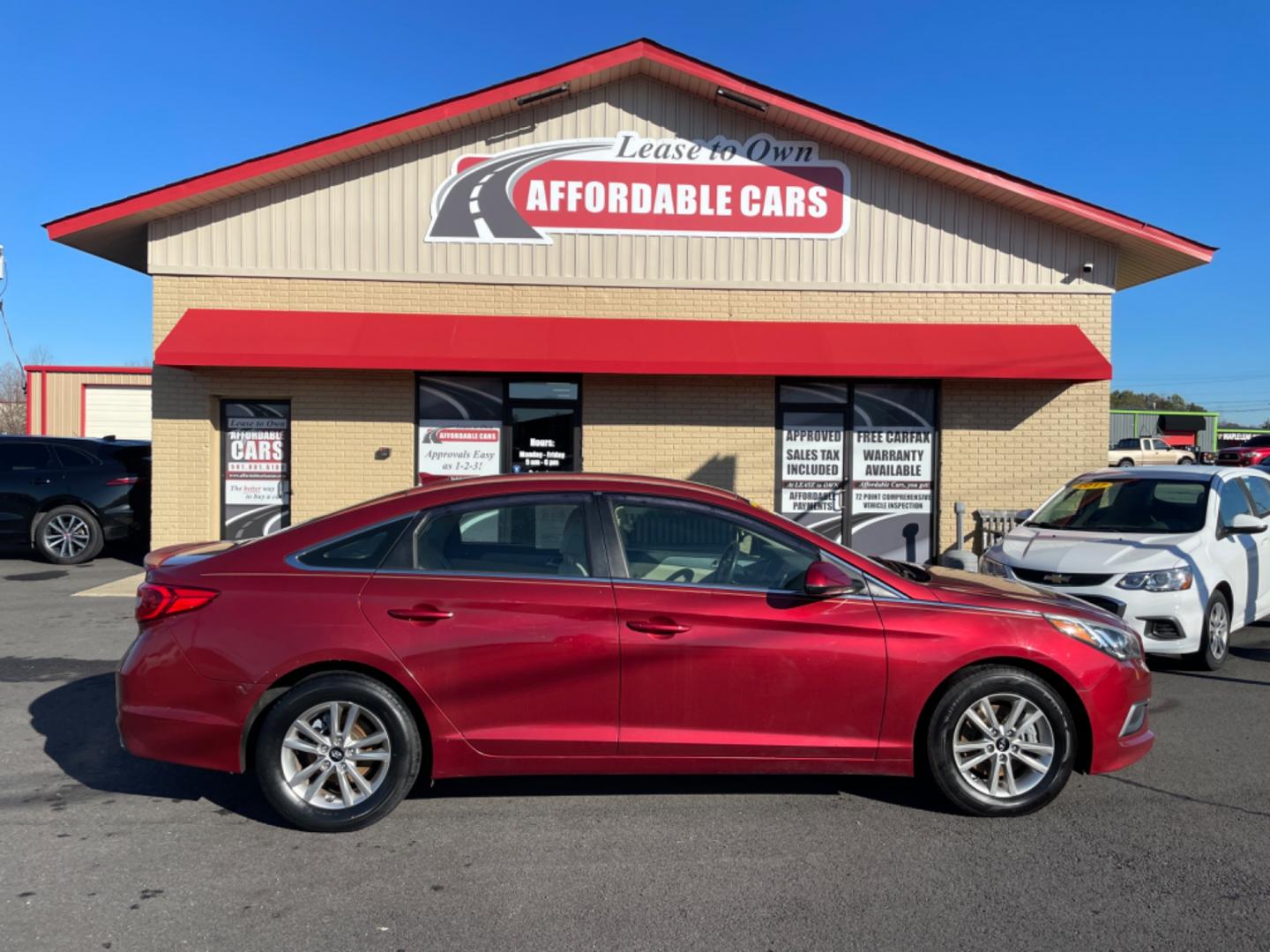 2016 Maroon Hyundai Sonata (5NPE24AF6GH) with an 4-Cyl, 2.4 Liter engine, Auto, 6-Spd w/Shiftronic and Drive Mode Select transmission, located at 8008 Warden Rd, Sherwood, AR, 72120, (501) 801-6100, 34.830078, -92.186684 - Photo#0